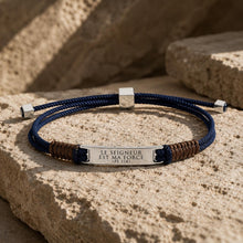 Load image into Gallery viewer, Fleur Nabert Creations Blue and Brown Braided Cord Bracelet with Engraved Zamak Plaque Inscribed with 'The Lord is My Strength'
