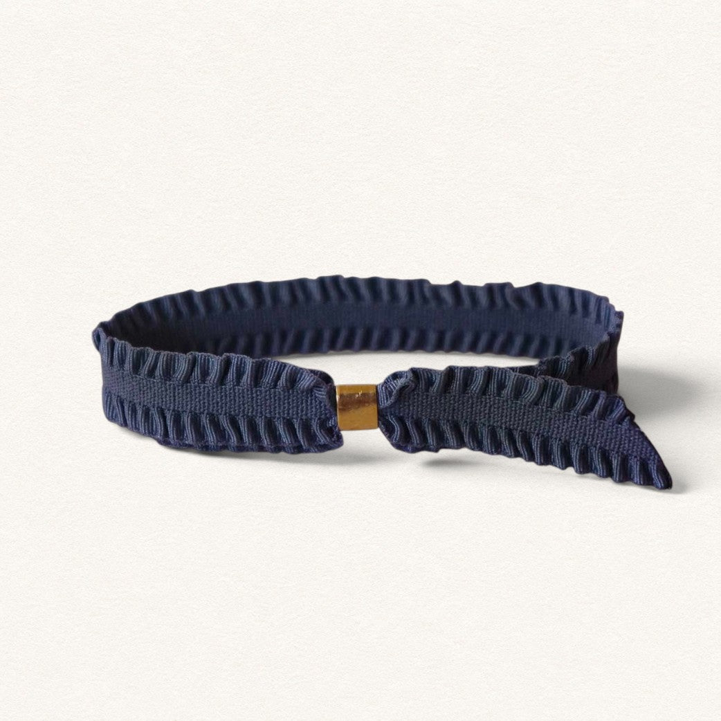 Navy blue Pompadour ribbon bracelet with a gold-toned clasp, from the Fleur Nabert Creations collection.