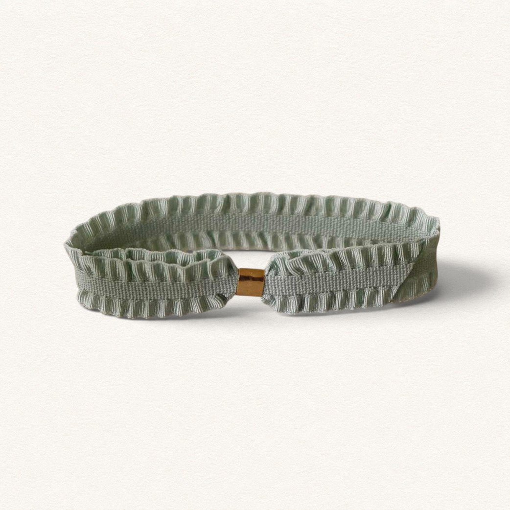 Celadon green Pompadour ribbon bracelet with a gold clasp, from the Fleur Nabert Creations collection
