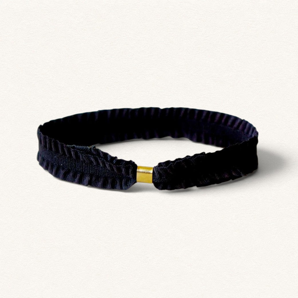 Black Pompadour ribbon bracelet with gold-plated clasp, from the Fleur Nabert Creations custom jewelry collection.